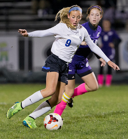 10-14-15 SOCCER Girls Champion Flashes vs Lakeview Bulldogs at Lakeview High School  1st half, Lakeviews #9 Reagan Rosenberger dribbles by Champions #19 Izzy DUrso.
