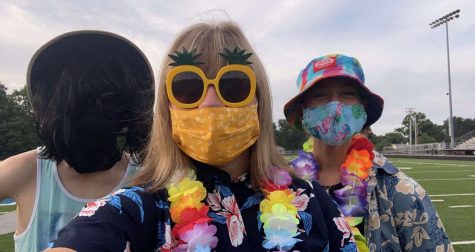 Summer band camp essentials: sunglasses, leis, and masks.