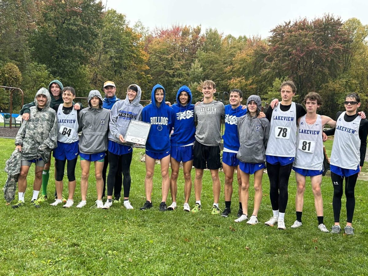 Boys Cross Country Run for the County Win